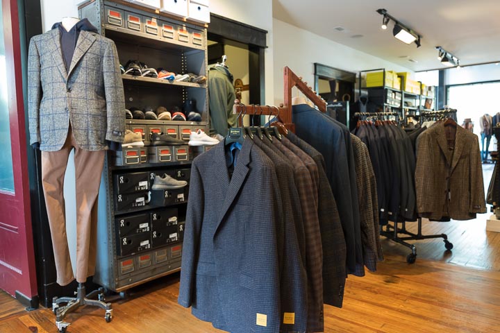 Suits hanging on racks